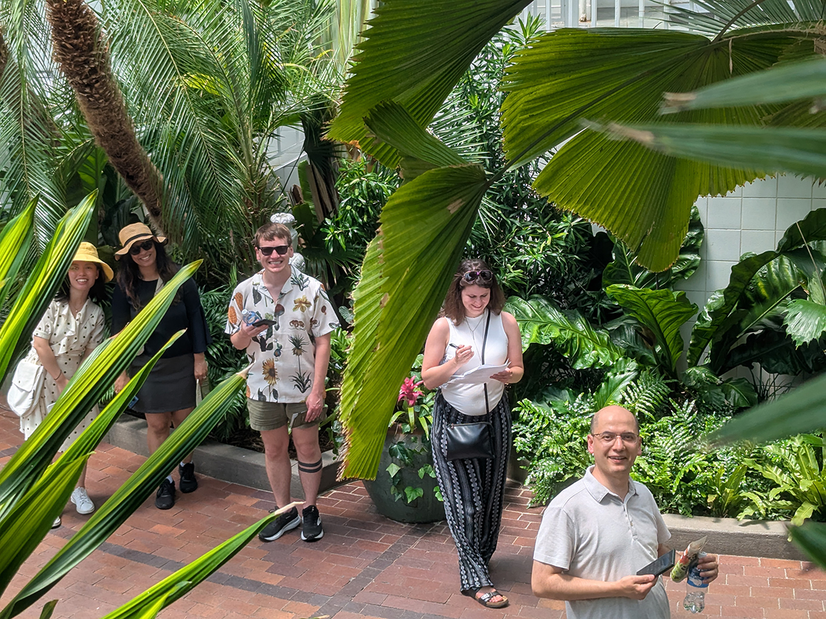 : Pathology trainees on a scavenger hunt at the Franklin Park Conservatory & Botanical Gardens. From left to right: Dr. Wenfang Liu, Dr. Sneha Datwani, Dr. Lucas Bushrow, Dr. Jessica Maupin, and Dr. Lokman Cevik