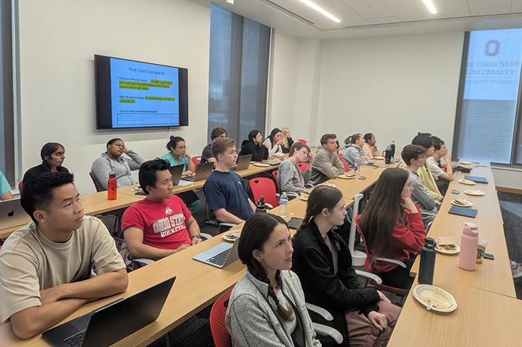 Dr. Gary Tozbikian gives a casual lecture to a group of students interested in Pathology.