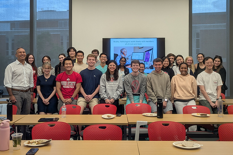 A group of students interested in Pathology pose for a photo.